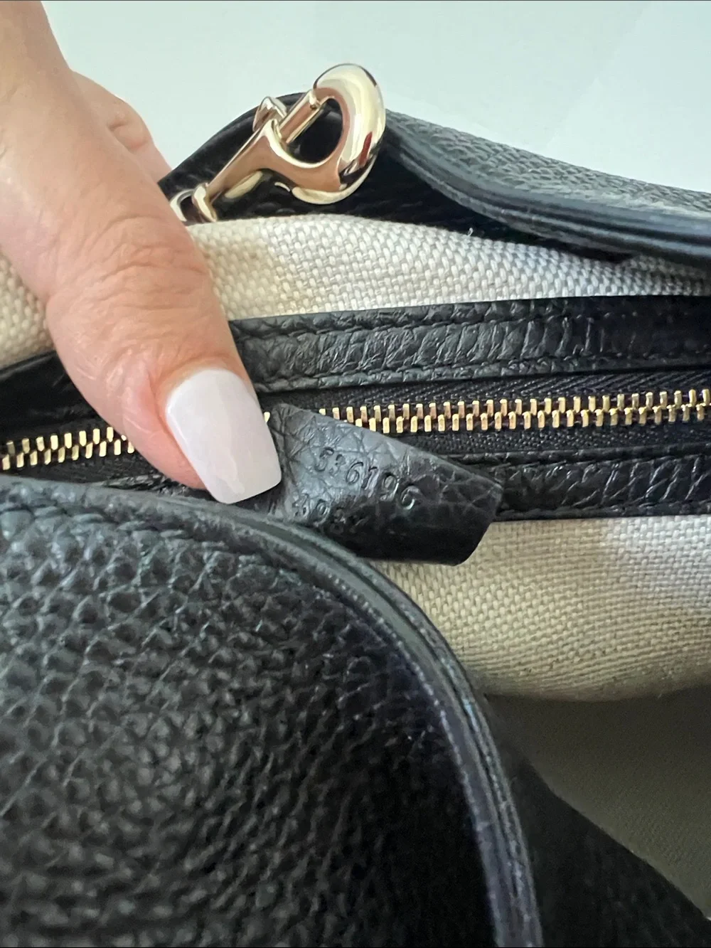 Gucci interlocking GG Black Soho Leather Shoulder Bag with Gold Chain and Tassel